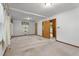 Spacious bedroom with neutral carpet, large windows, and multiple closets for ample storage at 5517 Spring Rd, Raleigh, NC 27603