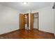Bedroom with hardwood floors, two closets and an attached bathroom at 5517 Spring Rd, Raleigh, NC 27603