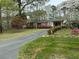 Beautiful single-story home with well-manicured landscaping and a private driveway at 5517 Spring Rd, Raleigh, NC 27603
