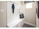 Well-organized mudroom with storage, seating, and charming decor at 568 Impala, Wendell, NC 27591