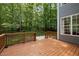 Wooden deck offers space for entertaining and a peaceful view at 606 Churton Grove Blvd, Hillsborough, NC 27278