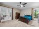 Bedroom with carpet floors, closet and door leading to a bonus room at 61 Stone Ledge, Pittsboro, NC 27312
