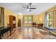 Spacious bonus room features hard wood floors, a ceiling fan, and a large window at 61 Stone Ledge, Pittsboro, NC 27312