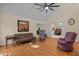 Inviting living room featuring hardwood floors, vaulted ceilings, and comfortable seating at 61 Stone Ledge, Pittsboro, NC 27312