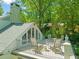 Private balcony with outdoor seating, offering scenic views and a relaxing atmosphere at 612 Swift Ave, Durham, NC 27701