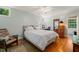 Bedroom featuring an accent chair, and hardwood floors at 612 Swift Ave, Durham, NC 27701