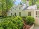 Attractive home exterior with dormer windows, brick accents, and manicured landscaping at 612 Swift Ave, Durham, NC 27701