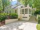 Rear exterior of home with a garage and upper level deck at 612 Swift Ave, Durham, NC 27701
