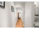 Hallway featuring arched doorways, hardwood floors and fresh paint at 612 Swift Ave, Durham, NC 27701