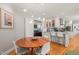 Kitchen featuring a butcher block table and bar seating overlooking a modern kitchen at 612 Swift Ave, Durham, NC 27701