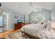 Spacious main bedroom featuring a bay window and ensuite bathroom at 612 Swift Ave, Durham, NC 27701