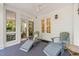 Relaxing screened porch featuring two lounge chairs at 612 Swift Ave, Durham, NC 27701