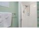 Modern shower features white subway tile, niche, and a rainfall shower head at 612 Swift Ave, Durham, NC 27701