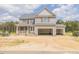 New two story construction with a two car garage and beautiful siding at 66 Sanders Farm Dr, Smithfield, NC 27577