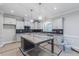 Modern kitchen with stainless steel appliances, granite countertops, island and ample cabinet space at 66 Sanders Farm Dr, Smithfield, NC 27577