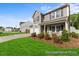 Charming two-story home with well-manicured lawn and inviting front porch, a perfect blend of comfort and style at 69 Curling Creek Dr # I286, Clayton, NC 27527