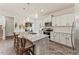 Modern kitchen with a center island, granite countertops, and stainless steel appliances at 69 Curling Creek Dr # I286, Clayton, NC 27527