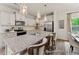 Modern kitchen featuring a large island, granite countertops, and stainless steel appliances at 69 Curling Creek Dr # I286, Clayton, NC 27527