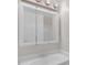 Bathroom sink area features a large mirror and modern faucet at 714 W Mckinley St, Mebane, NC 27302