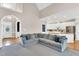 Spacious living area with a comfortable sectional couch and an open view to the kitchen at 750 James Norris Rd, Angier, NC 27501
