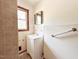 Bathroom with classic vanity and window for natural light at 80 Dunn Rd, Louisburg, NC 27549