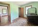 Bedroom with vintage dresser and ample natural light at 80 Dunn Rd, Louisburg, NC 27549