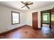 Bedroom featuring hardwood floors, natural light, and neutral walls at 80 Dunn Rd, Louisburg, NC 27549