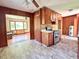 Efficient kitchen with a stainless steel range, and a view to the living room at 80 Dunn Rd, Louisburg, NC 27549