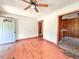 Inviting living room boasting hardwood floors, a ceiling fan, and views into other rooms at 80 Dunn Rd, Louisburg, NC 27549