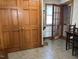 Welcoming entryway features wood closet and tile floors at 8019 W Tarboro Rd, Rocky Mount, NC 27803