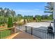 Well-maintained backyard with patio, fence, and landscaped yard at 808 Wimberly Rd, Apex, NC 27523