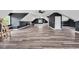 Spacious bonus room with wood-look floors, neutral paint, great ceiling height, and ceiling fans at 808 Wimberly Rd, Apex, NC 27523