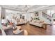 Spacious living room with hardwood floors, stylish decor and open layout at 808 Wimberly Rd, Apex, NC 27523