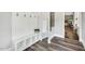 Organized mudroom features built-in storage and stylish flooring at 808 Wimberly Rd, Apex, NC 27523