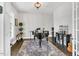 Serene office space featuring hardwood floors, natural light, and an elegant piano at 808 Wimberly Rd, Apex, NC 27523