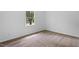 Bedroom with carpet floor, a window, and neutral walls at 81 Honeysuckle Dr, Pittsboro, NC 27312