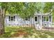 Charming single-story home featuring a well-maintained lawn and inviting front porch at 81 Honeysuckle Dr, Pittsboro, NC 27312