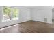 Bright living room with a large window at 81 Honeysuckle Dr, Pittsboro, NC 27312