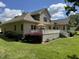 Spacious backyard with a patio, offering great outdoor living space with an outdoor grill at 84 Macbeth Ln, Roxboro, NC 27574