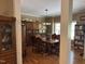 Dining room featuring hardwood floors and elegant wood table with furniture and built-in cabinet at 84 Macbeth Ln, Roxboro, NC 27574