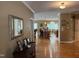 Inviting foyer with gleaming hardwood floors leading to the open-concept kitchen and living area at 84 Macbeth Ln, Roxboro, NC 27574