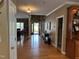 Inviting foyer with hardwood floors flows into the living spaces, creating a warm and welcoming ambiance at 84 Macbeth Ln, Roxboro, NC 27574