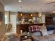 Open-concept living space with seamless transition to kitchen and breakfast nook for easy living and entertaining at 84 Macbeth Ln, Roxboro, NC 27574