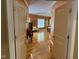 Inviting hallway view into the spacious main bedroom with hardwood floors and natural light at 84 Macbeth Ln, Roxboro, NC 27574