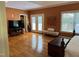 Spacious main bedroom with hardwood floors, tray ceiling, and access to the backyard at 84 Macbeth Ln, Roxboro, NC 27574