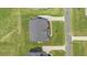 Aerial view of the property showcasing the roof, yard, and driveway at 8416 Brady Pointe Rd, Fuquay Varina, NC 27526