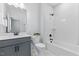 Modern bathroom with tub and shower combination and vanity at 8416 Brady Pointe Rd, Fuquay Varina, NC 27526