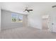 Spacious bedroom with lots of natural light and carpeted floors at 8416 Brady Pointe Rd, Fuquay Varina, NC 27526