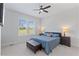 Cozy bedroom with plush carpet, neutral walls, and comfortable bed topped with stylish bedding at 8416 Brady Pointe Rd, Fuquay Varina, NC 27526
