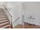 Inviting entryway with hardwood floors and stairs leading to the upper level at 8416 Brady Pointe Rd, Fuquay Varina, NC 27526
